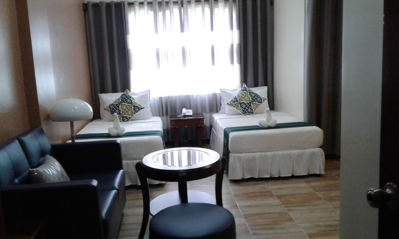 Hotel Charos Dormitel Dumaguete City Exterior foto