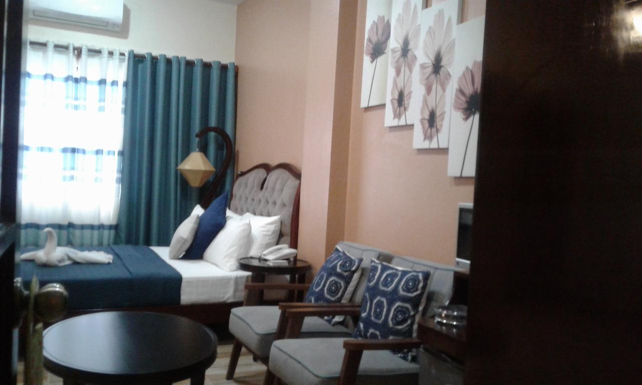 Hotel Charos Dormitel Dumaguete City Exterior foto
