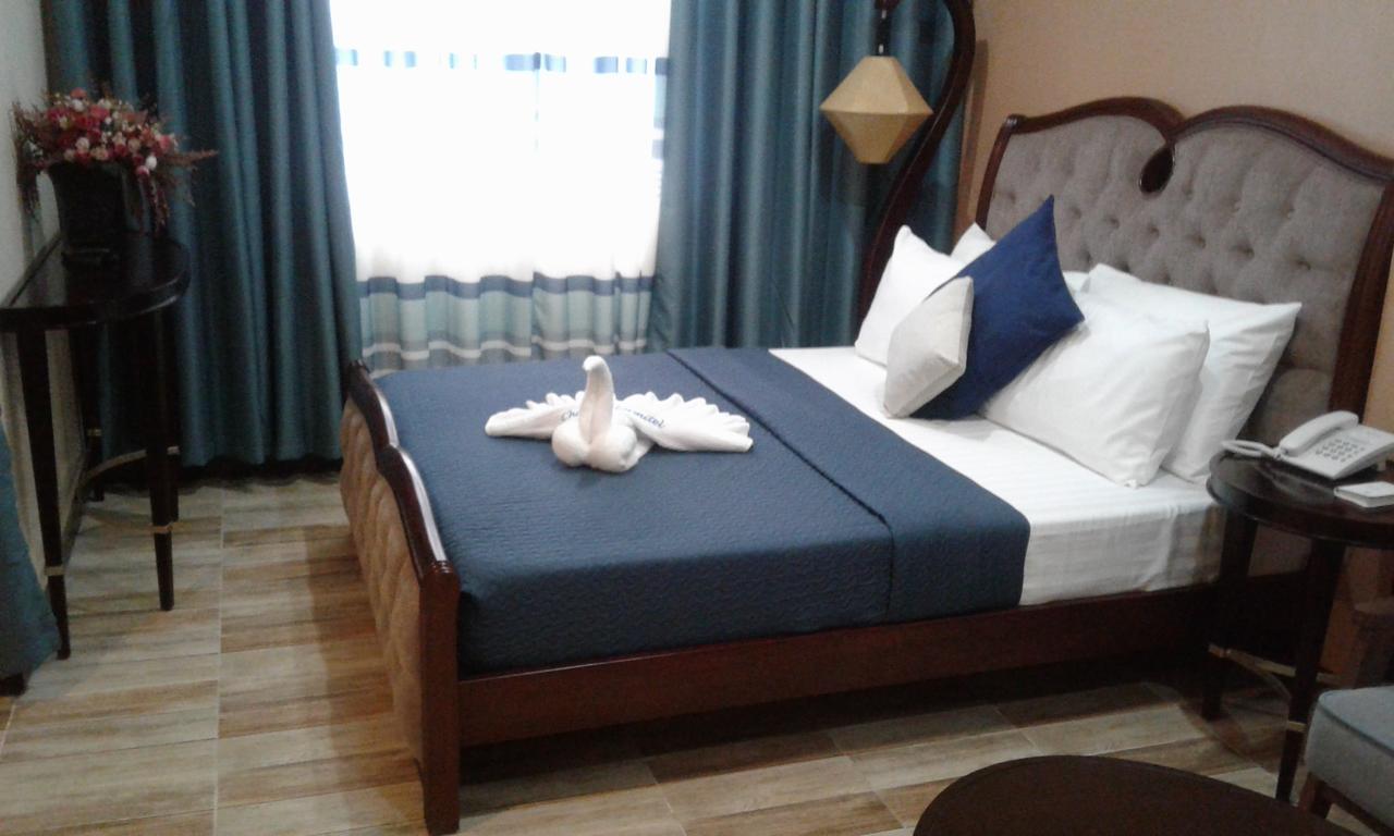 Hotel Charos Dormitel Dumaguete City Exterior foto